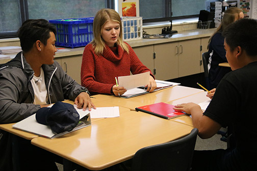 Juniors studying in a classroom.