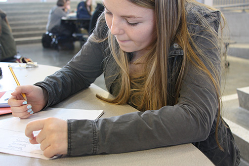 A freshman studying for finals.