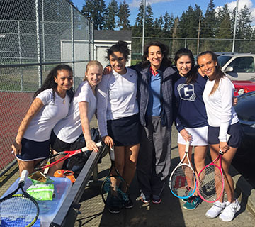 Liese with her coach and team members.