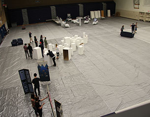 Students set up the gym for the event.