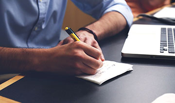 A guy studying.
Credit: epixels.com