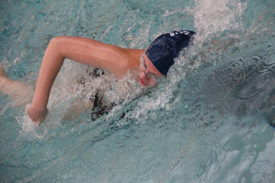 Mott swimming at practice.