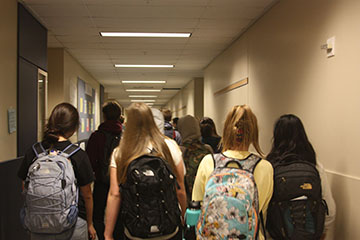 The students in the crowded 2nd floor hallways.