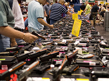 One of the worlds largest gun shows in Houston, Texas.  Currently, most states do not require a background check before someone purchases a gun at a show.
Credit: Flickr.com