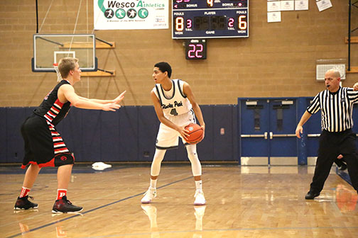 Trey Lawrence faces off against a Ballard High School player.