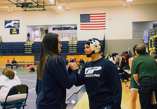 Kate Jankins supports Kiley Hubby before her match.