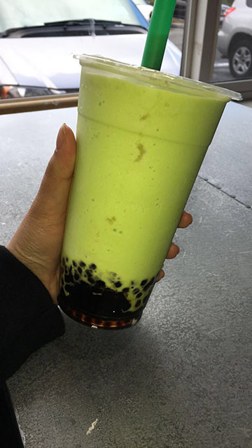 Honeydew bubble tea with mini boba from Pochis