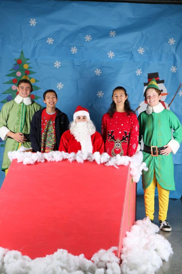 The Ugly Sweater Day Santa picture photo booth.