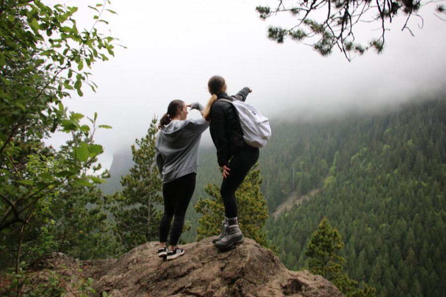 Students Jessica Delker and Amanda Riedlinger hiking on Mt. Si