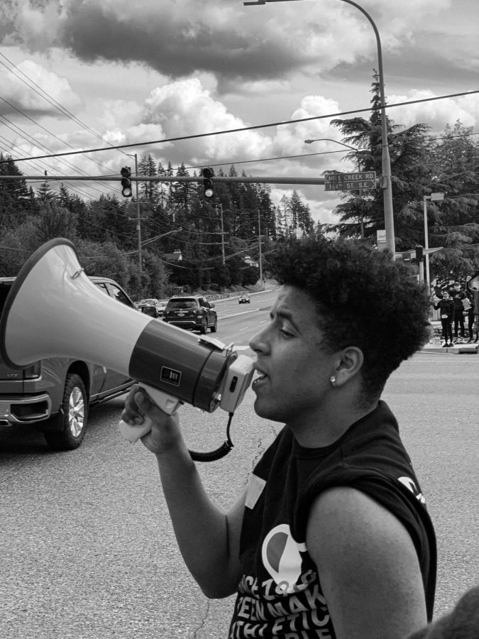 Keyshon Rife, leading chants to the protesters.