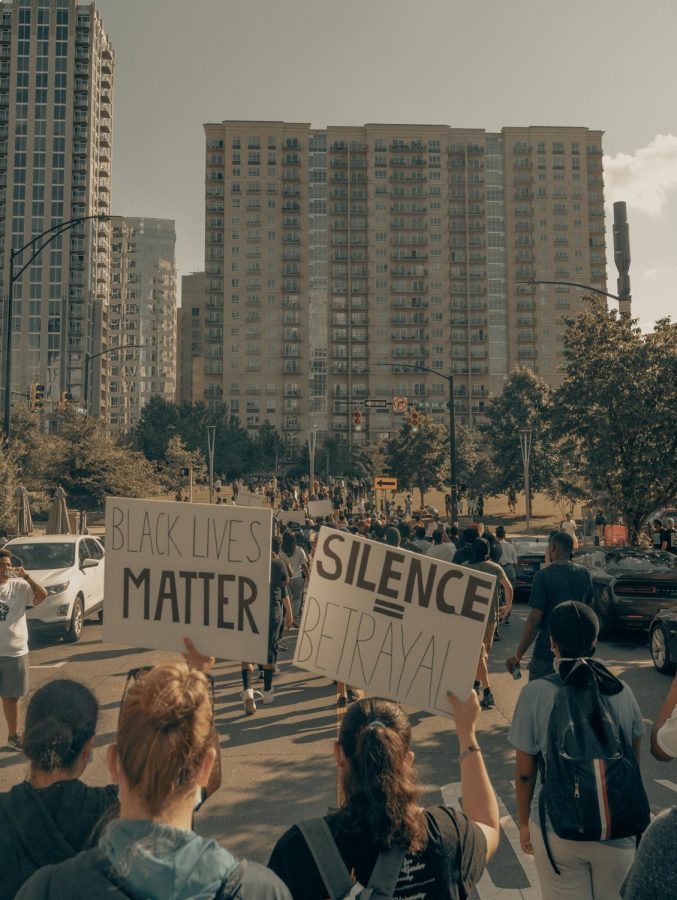 Protesters rally for BLM in the wake of George Floyds murder. photo by Clay Banks