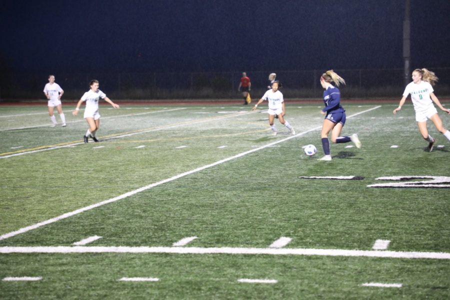 Ryann Reynolds sets up to bury the opening goal of the match