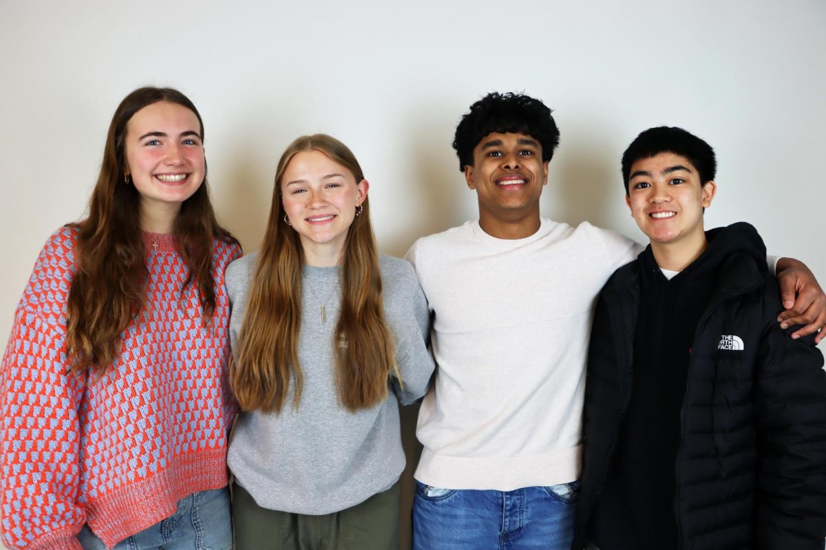The junior class officers, Isabella Leffingwell, Marcy Mossburg, Aaron Thomas, and Dominic Cerdenola. 